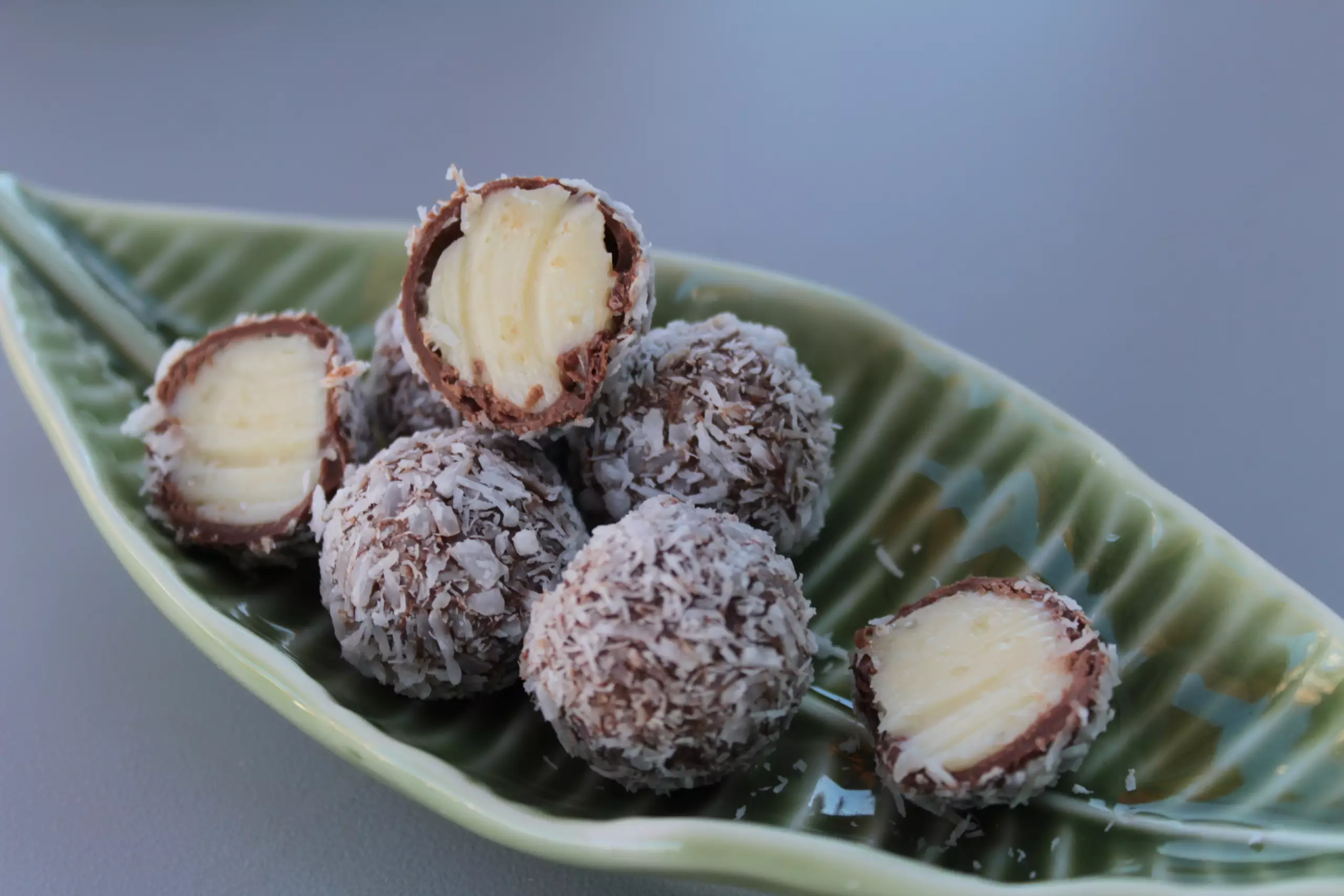 Qual a origem da trufa de chocolate e quais são as suas principais características?